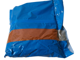 a blue bag with a brown strip on it