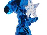 crystal figurine of a wizard with a star in his hand
