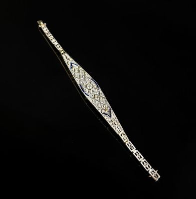 an art deco diamond and gold bracelet