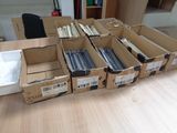several cardboard boxes are stacked on top of each other on a table