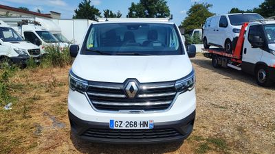 a white van that is parked in a lot