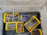 a tool box with many different types of screws in it