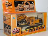 a box with a toy truck in it on a table