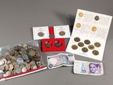 a lot of coins and a note on the table