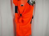 a close up of an orange safety vest hanging on a wall