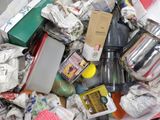 a pile of trash that is sitting on the floor