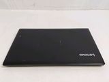 a black laptop on a white surface with a white background