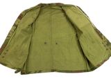 the jacket is green and has a camouflage pattern on it