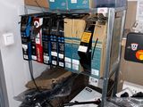 many boxes on the shelves in the room