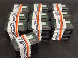 a stack of plastic containers with a lot of ram modules