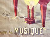 a poster advertising a musical instrument on a table