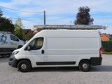 a white van that is parked in a parking lot
