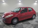 a picture of a red car parked in a garage