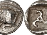 a close up of a coin with a horse on it