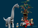 a lego dinosaur that is standing next to a toy truck