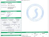 a green and white document with a picture of a person holding a cell phone