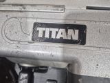 an image of a close up of a train engine with the word titan on it