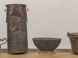 three vases sitting on a table next to each other
