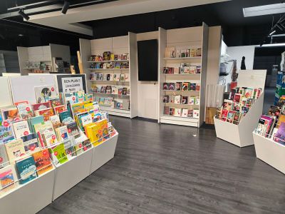 a lot of books on display in the store