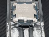 packaging of amd ryzenn processor on black table with white background