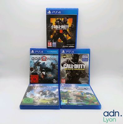 three video games are stacked on top of each other on a white surface