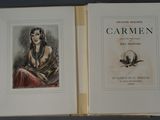 an open book with a drawing of a woman sitting on a chair