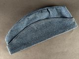a piece of denim that is laying on a table
