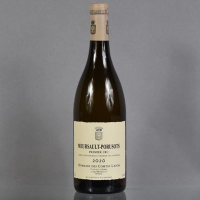 a bottle of wine that is sitting on a table
