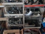 several boxes of assorted items are stacked on top of each other in a room