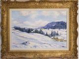 un tableau représentant un paysage enneigé, dans un cadre doré
