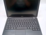 a laptop computer that is sitting on a table