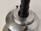 a metal object that is sitting on top of a sink