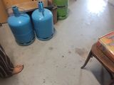 an image of a room with a lot of stuff on the floor
