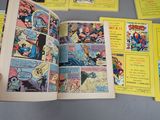a person holding a comic book open on a table