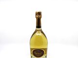 an image of a bottle of wine sitting on top of a white table