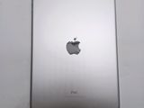 a close up of the back of an ipad with an apple logo on it