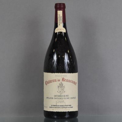 a bottle of wine that is sitting on a table