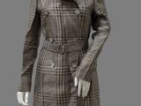 female mannequin dressed in a brown plaid coat and skirt