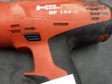 a cordless drill on a table with a price tag on it
