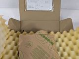 a cardboard box with a piece of food inside of it