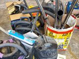 many different types of vacuums and other tools on the floor