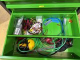 a green box with wires and other electrical equipment in it