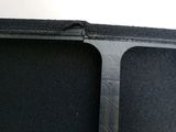 a close up of a laptop with a black cover