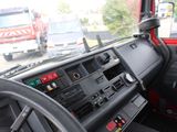 a view of the inside of a bus from the driver ' s seat