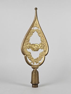 an image of a gold - plated clock on a stand
