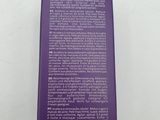a box of face serum on a white surface