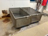 a metal container that is sitting on the ground