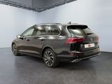 the rear end of a grey volkswagen vw passat