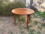 a small table that is sitting in the grass