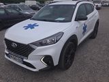 a white car with a blue star on the front